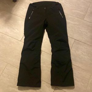 Black snow pants size L. Helly Hansen brand.